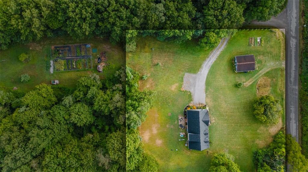 105 Jacobs Road Harrisville, PA 16038 - Photo 33 of 38 an aerial view of residential house with outdoor space and lake view