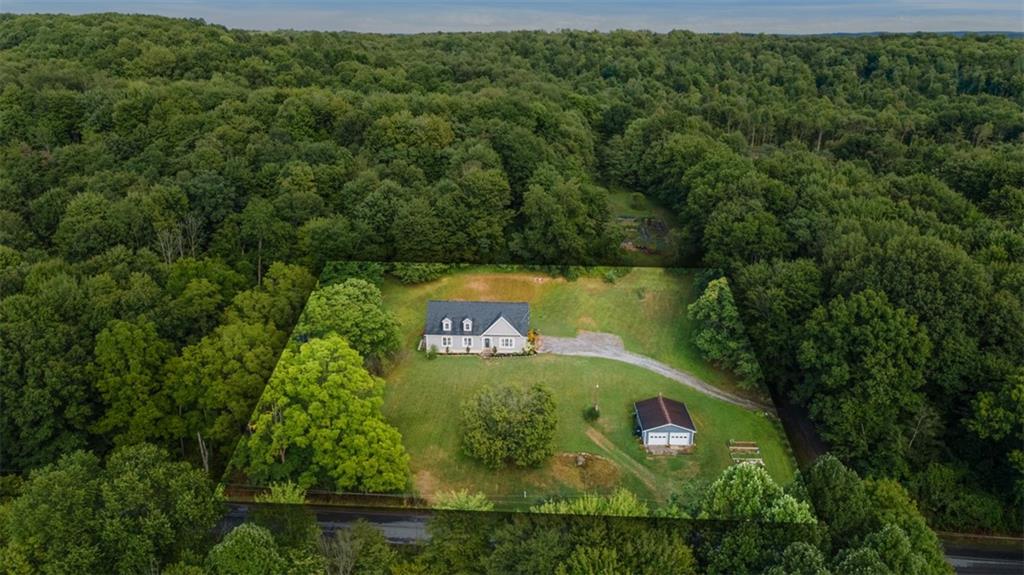 105 Jacobs Road Harrisville, PA 16038 - Photo 37 of 38 an aerial view of a residential houses with outdoor space and trees all around