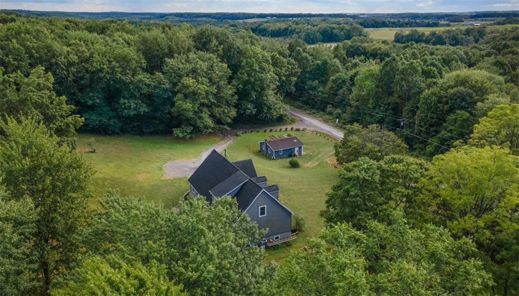 105 Jacobs Road Harrisville, PA 16038 - Photo 38 of 38 an aerial view of a house with a yard