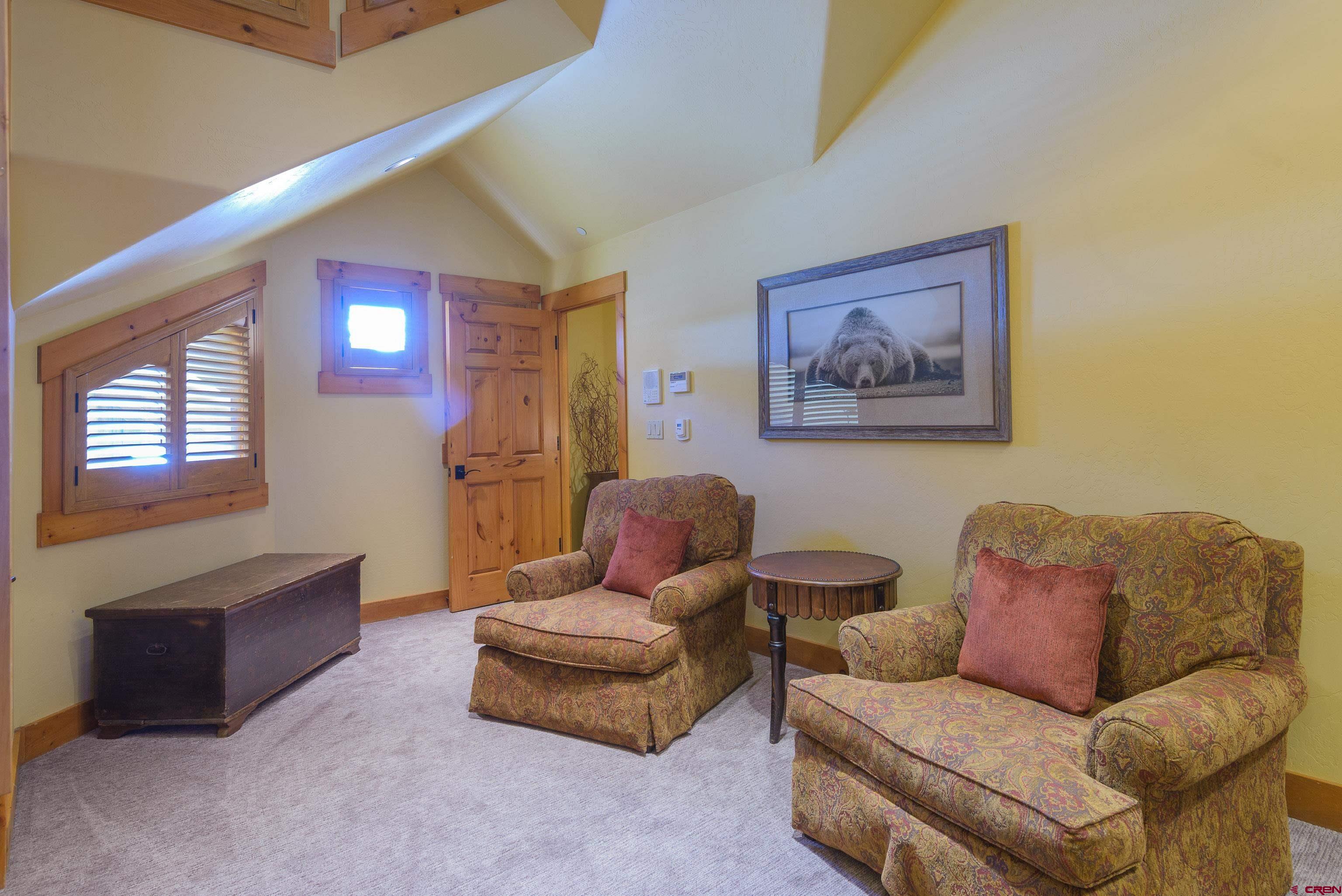 16 Snowmass Road, Unit 7 Crested Butte, CO 81225 - Photo 34 of 37 a living room with furniture