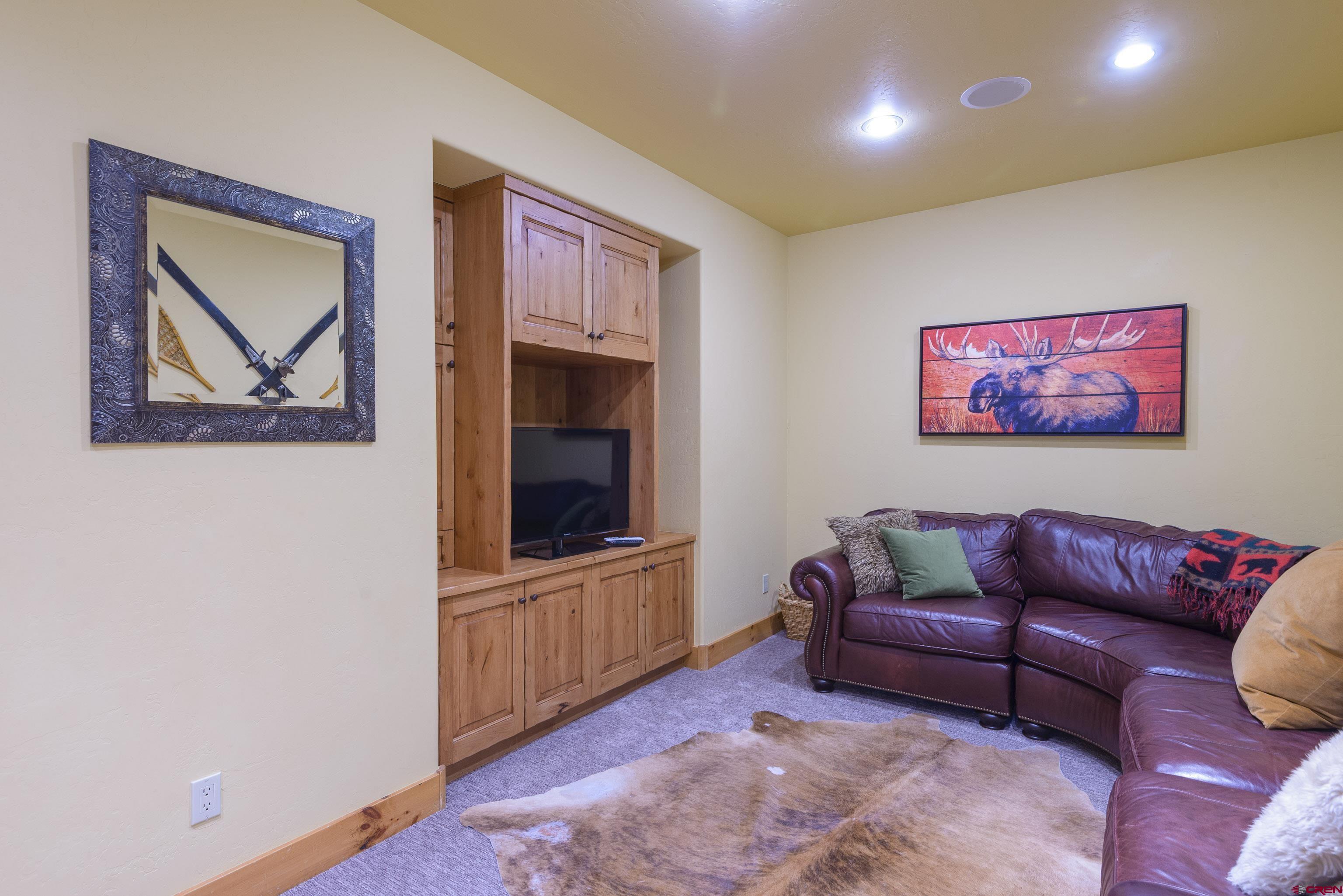 16 Snowmass Road, Unit 7 Crested Butte, CO 81225 - Photo 6 of 37 a living room with furniture and a window