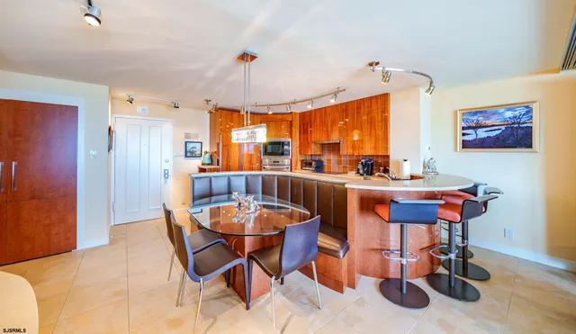 a large bathroom with a glass shower door