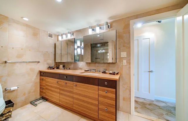a view of a kitchen with cabinets
