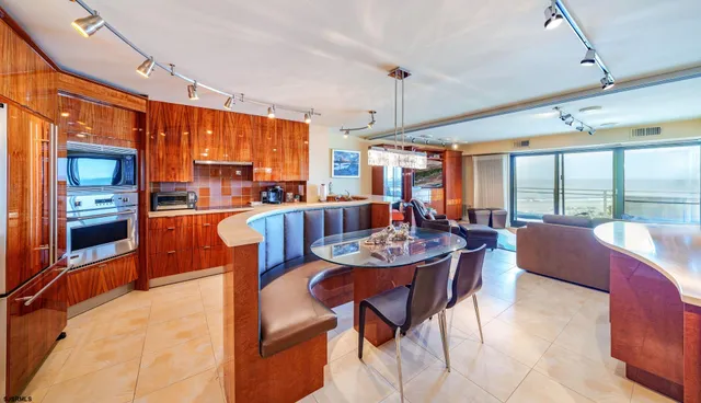a view of a living room and dining room