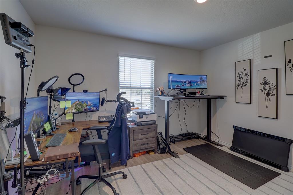 7404 Seton Place McKinney, TX 75071 - Photo 23 of 29 a view of a workspace with furniture and a window