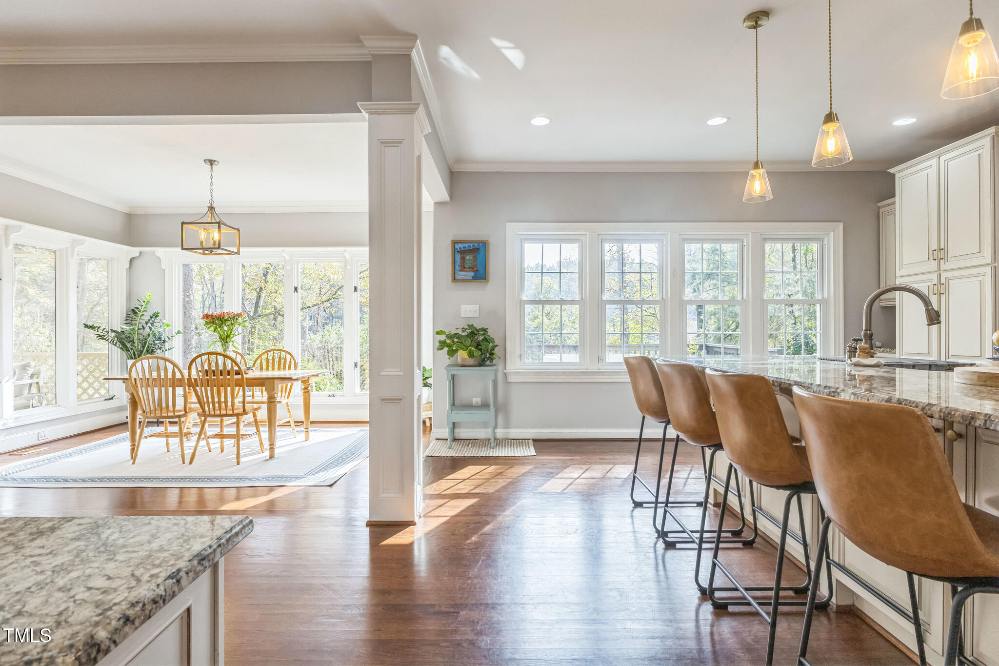1708 Pendelton Drive Raleigh, NC 27614 - Photo 11 of 54 a view of a dining room with furniture window and wooden floor