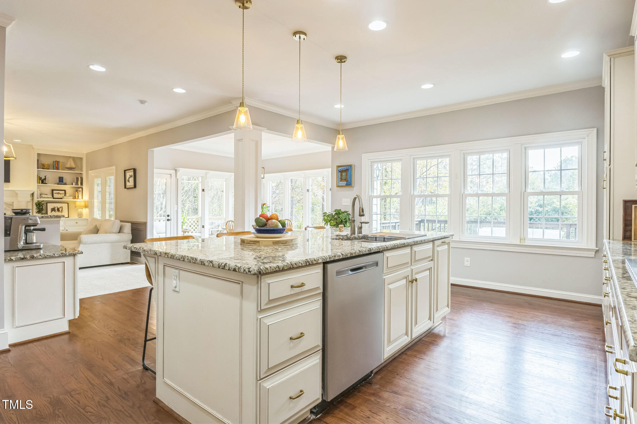 1708 Pendelton Drive Raleigh, NC 27614 - Photo 15 of 54 a kitchen with granite countertop white cabinets and white appliances