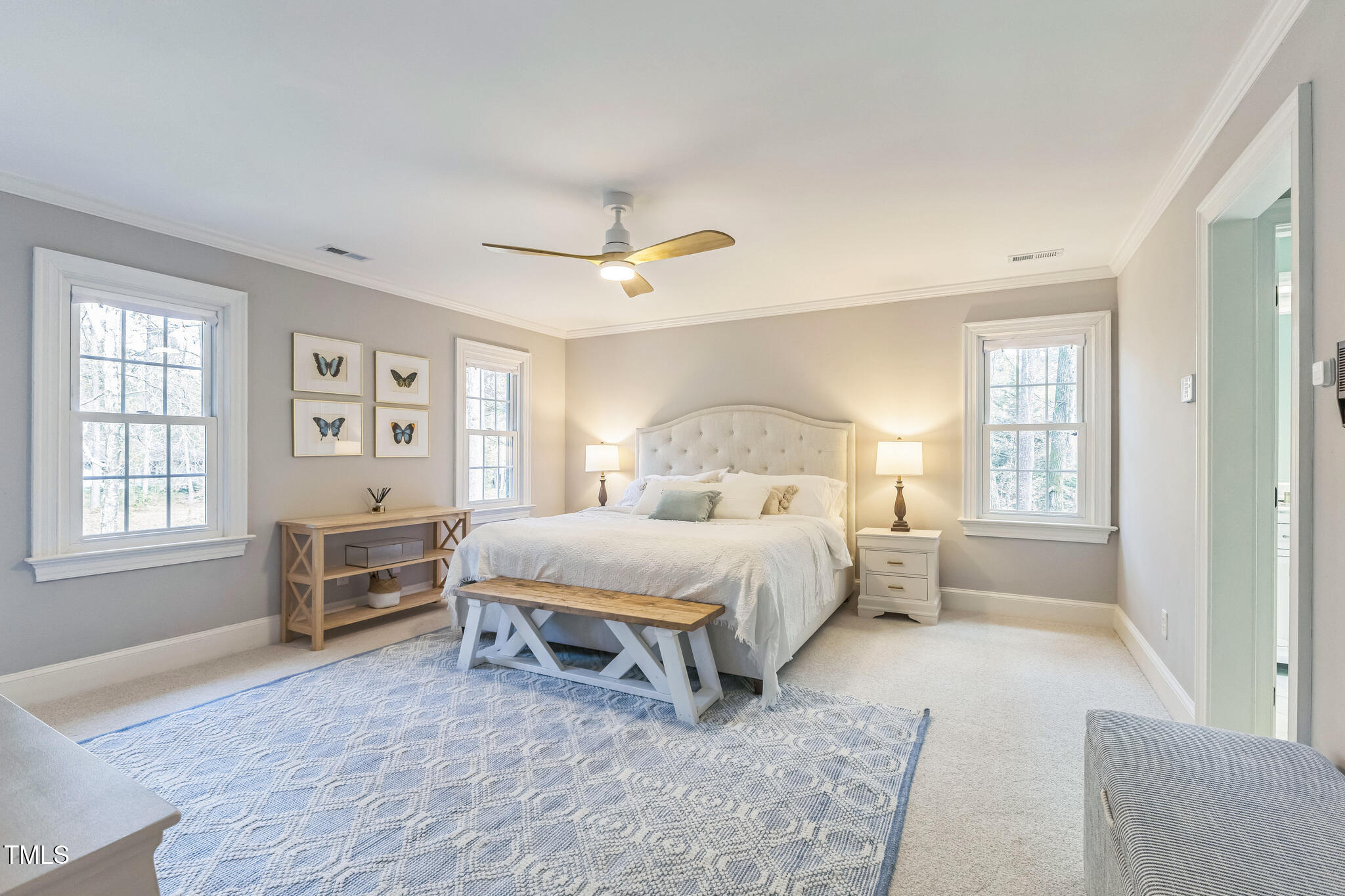1708 Pendelton Drive Raleigh, NC 27614 - Photo 19 of 54 a bedroom with a large bed and a table in it