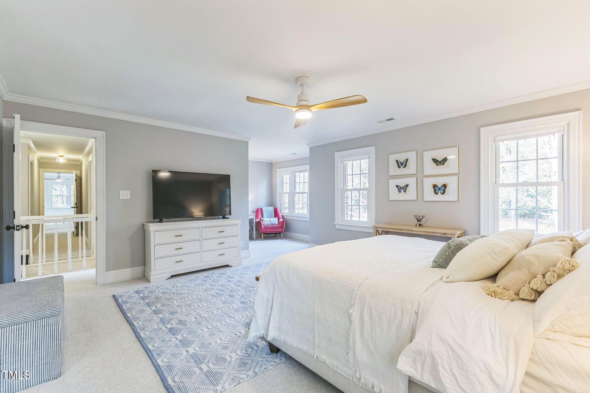 1708 Pendelton Drive Raleigh, NC 27614 - Photo 22 of 54 a bedroom with a bed and a flat screen tv