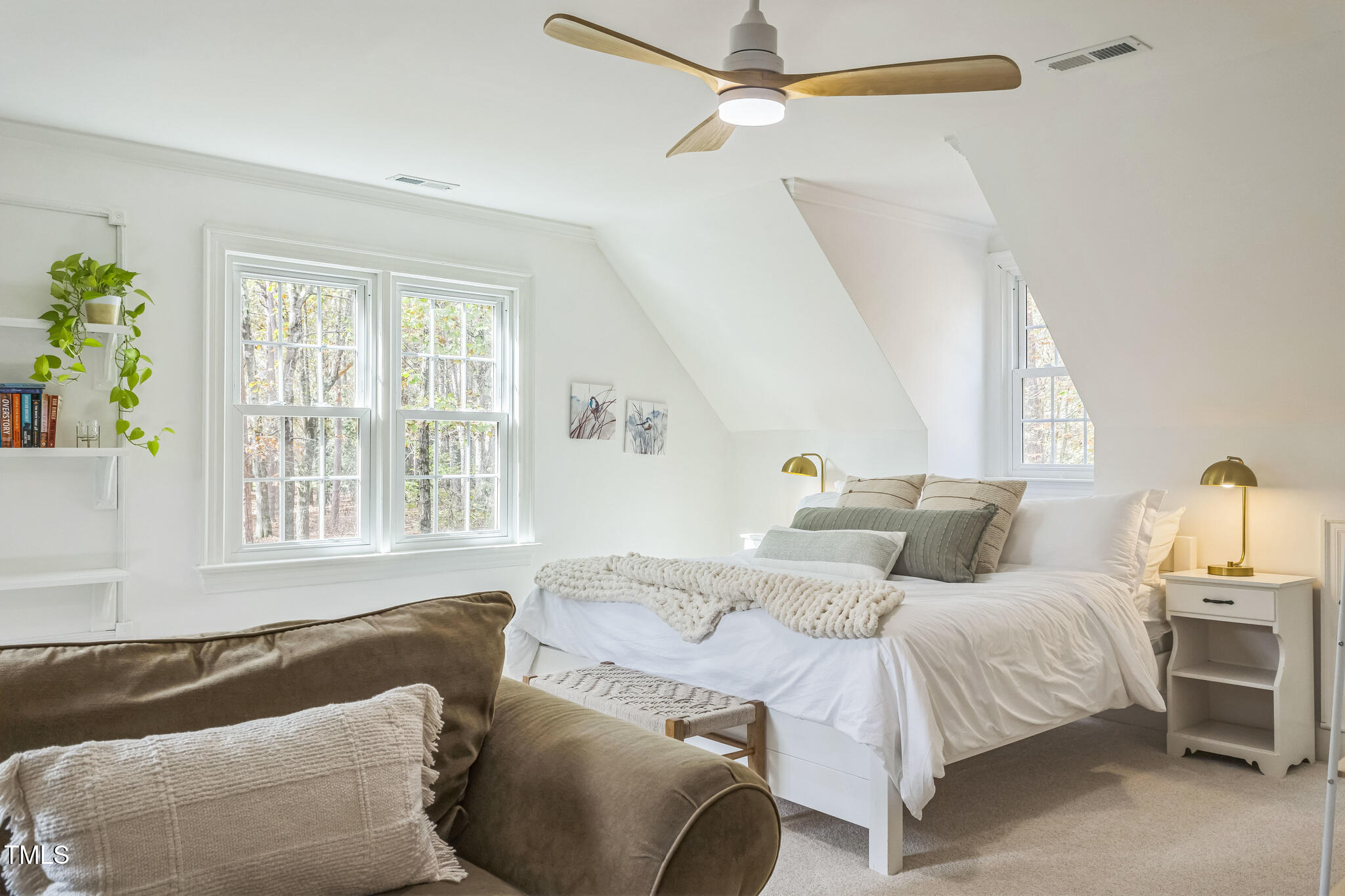1708 Pendelton Drive Raleigh, NC 27614 - Photo 28 of 54 a bedroom with a bed and a large window