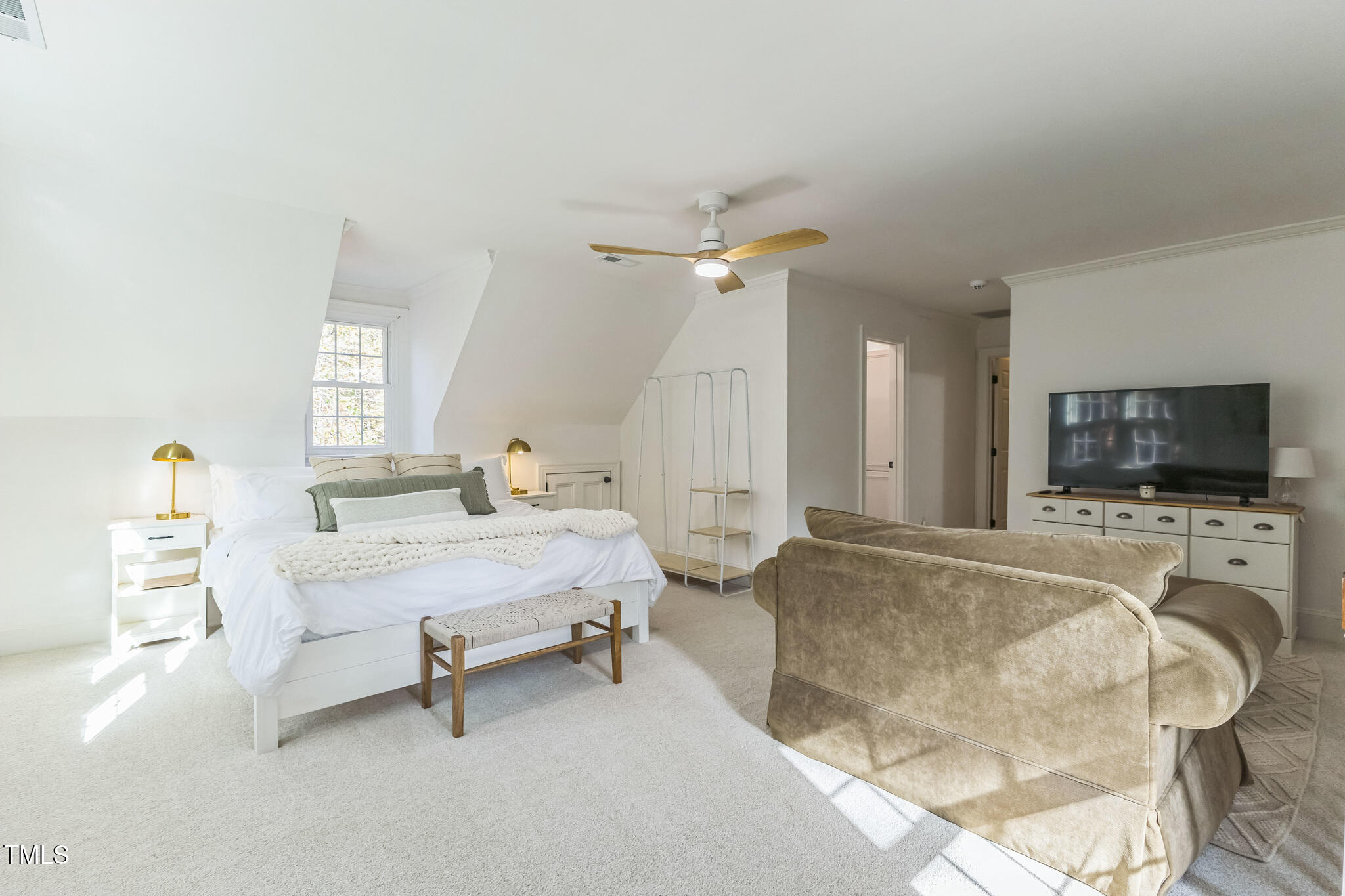 1708 Pendelton Drive Raleigh, NC 27614 - Photo 29 of 54 a living room with furniture and a flat screen tv