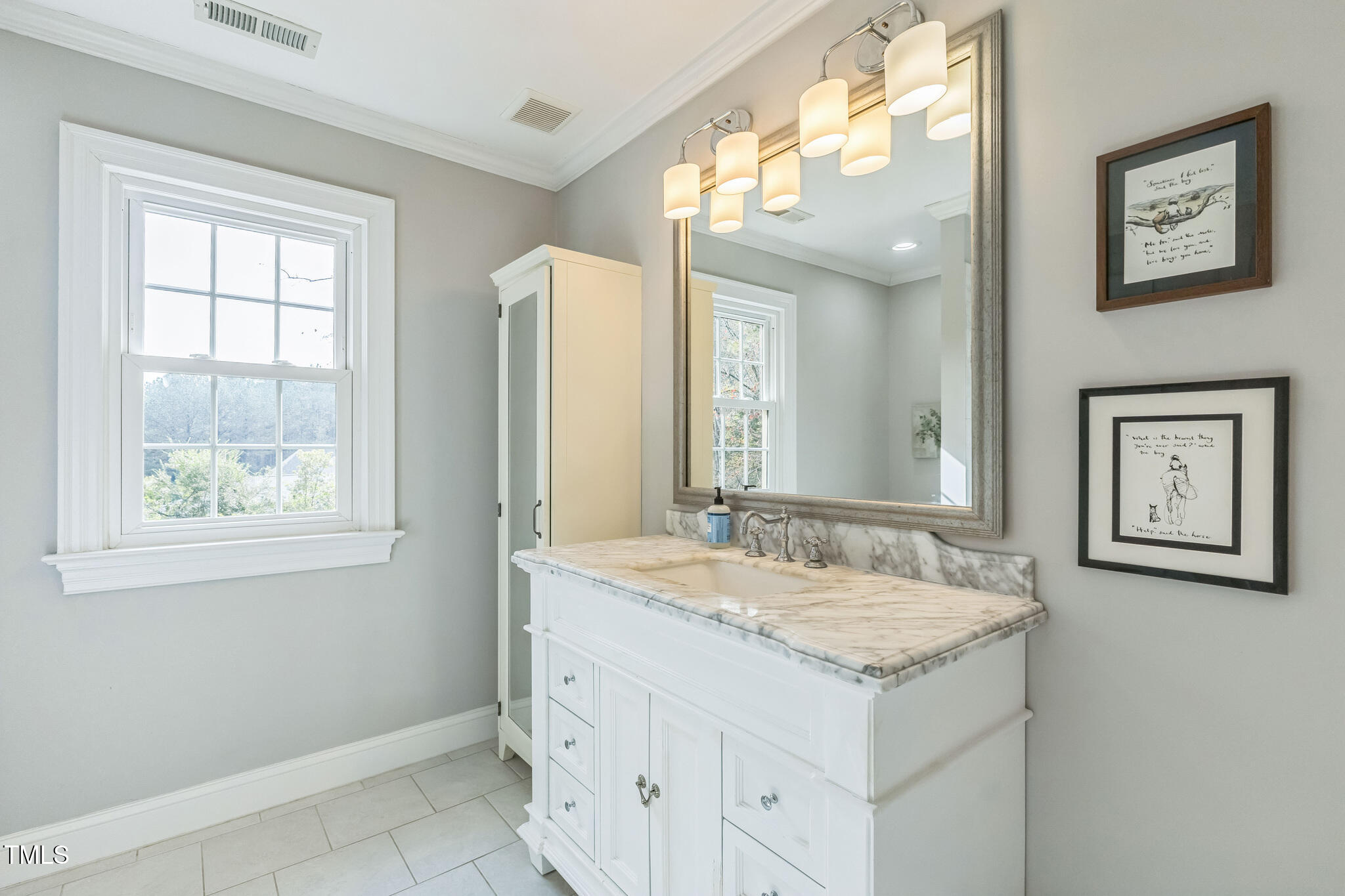 1708 Pendelton Drive Raleigh, NC 27614 - Photo 30 of 54 a bathroom with a granite countertop sink a mirror and a window