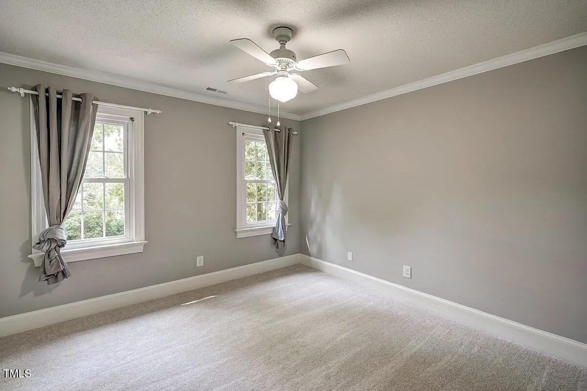 1708 Pendelton Drive Raleigh, NC 27614 - Photo 31 of 54 a view of an empty room with a window