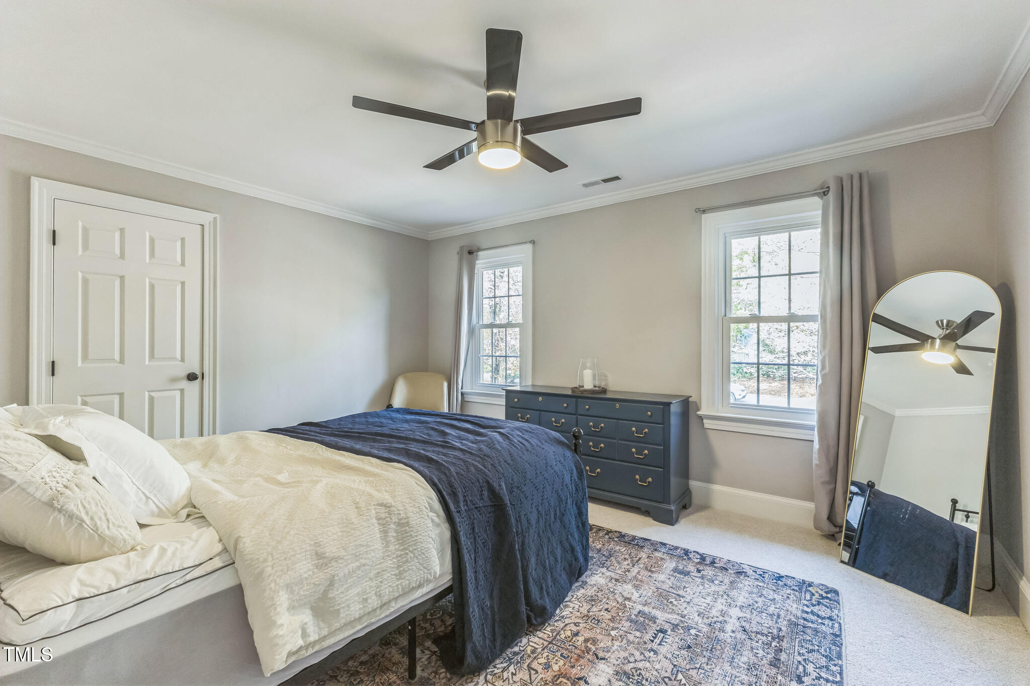 1708 Pendelton Drive Raleigh, NC 27614 - Photo 32 of 54 a bedroom with a bed and a dresser
