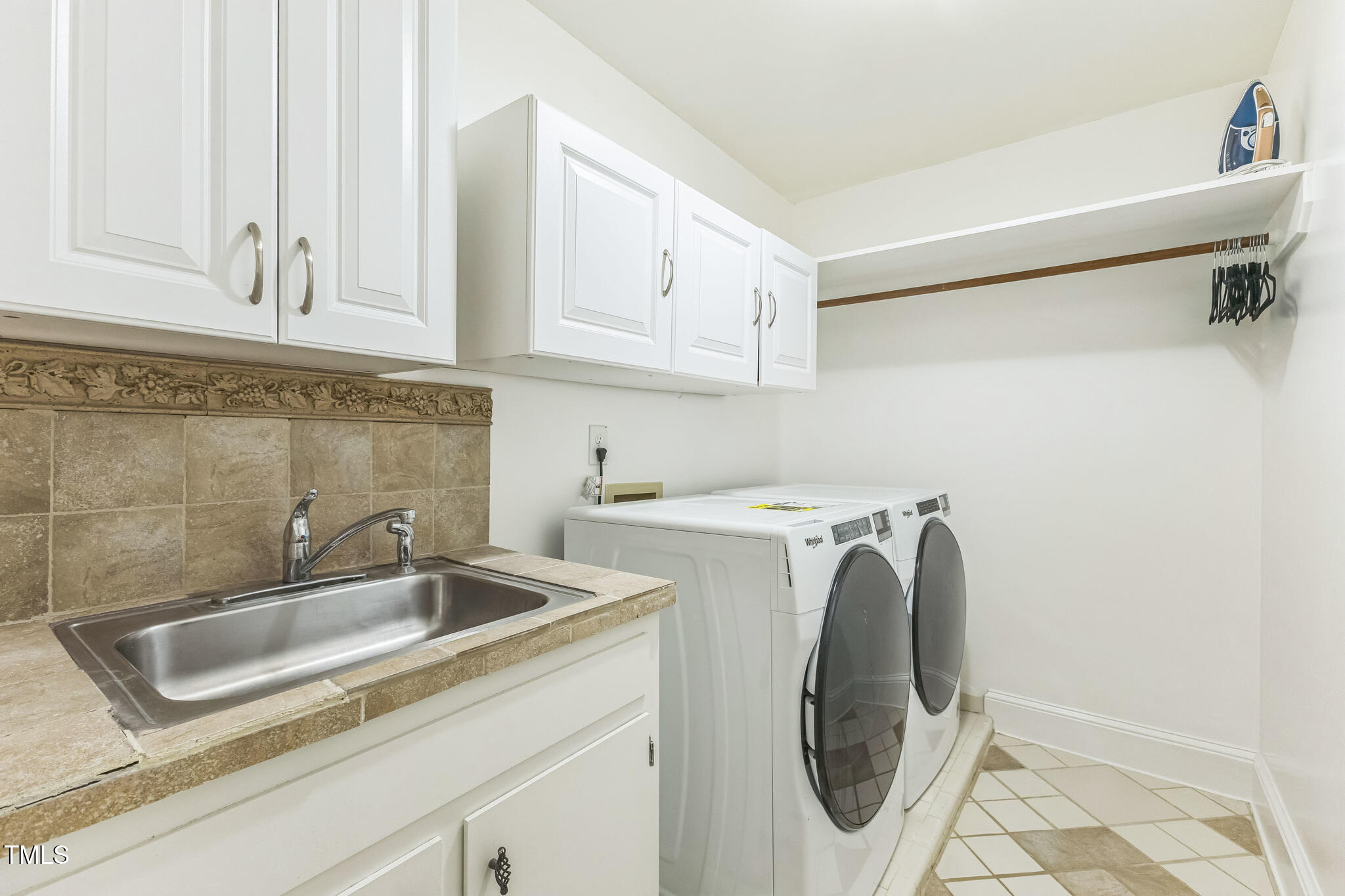 1708 Pendelton Drive Raleigh, NC 27614 - Photo 35 of 54 a utility room with dryer and washer