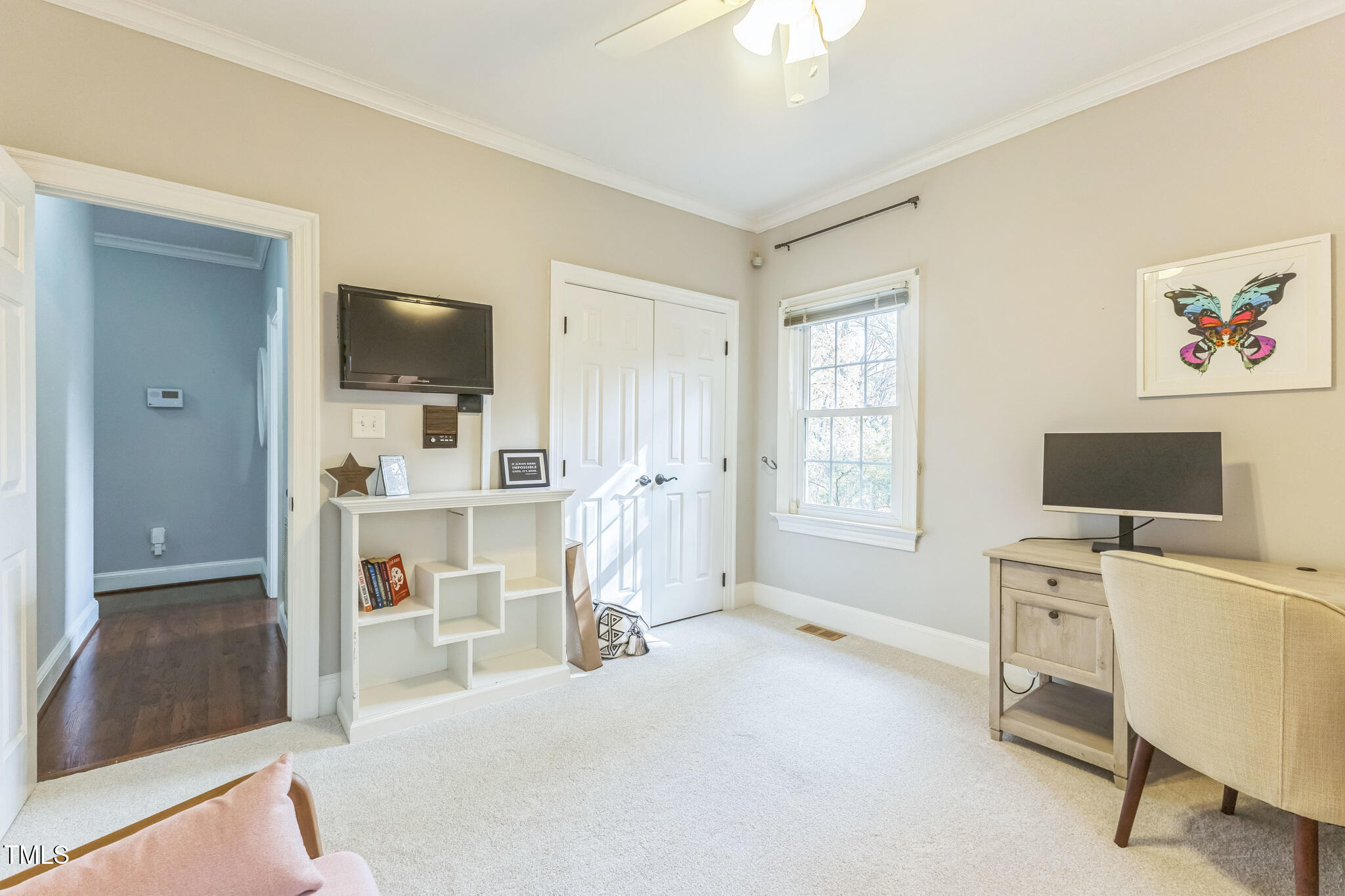 1708 Pendelton Drive Raleigh, NC 27614 - Photo 37 of 54 a view of a workspace with furniture and a window