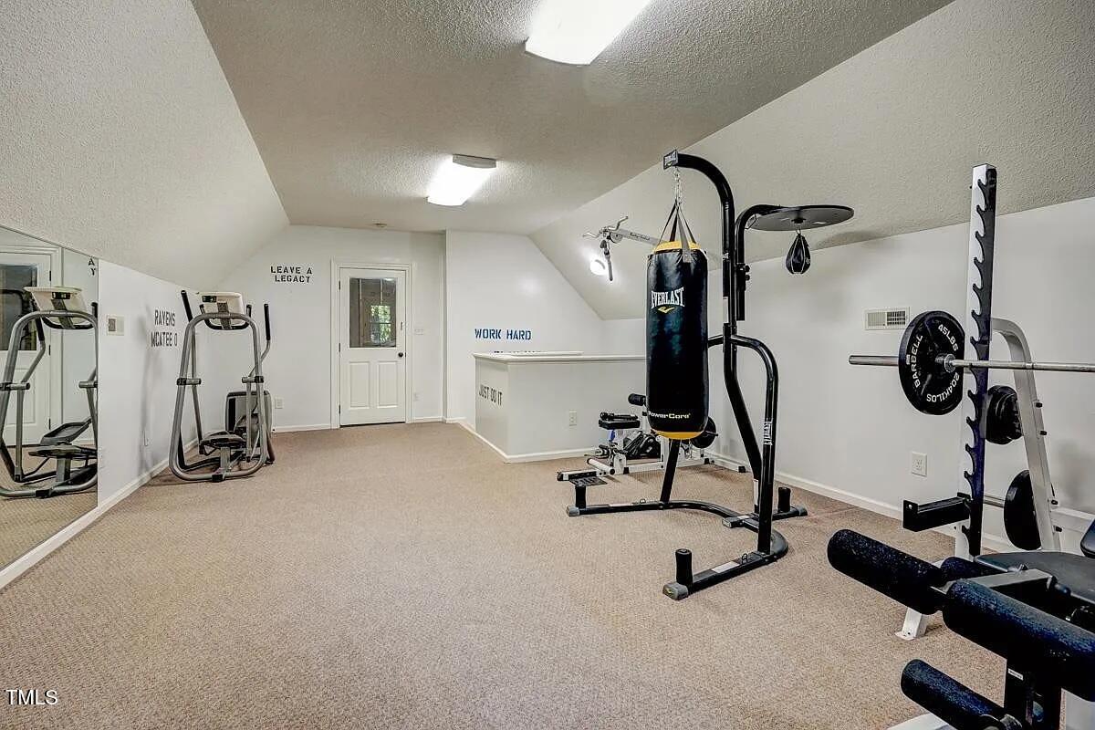 1708 Pendelton Drive Raleigh, NC 27614 - Photo 41 of 54 a view of a room with gym equipment