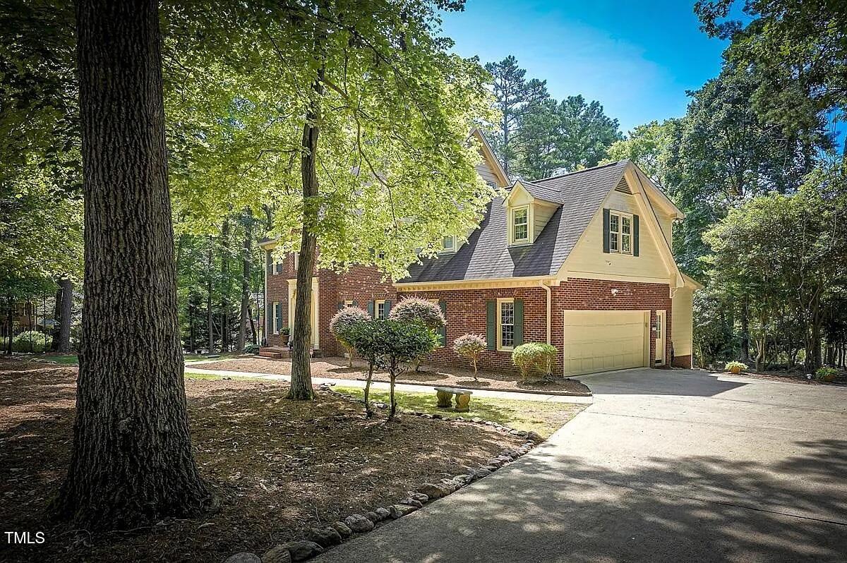 1708 Pendelton Drive Raleigh, NC 27614 - Photo 52 of 54 a front view of a house with a yard