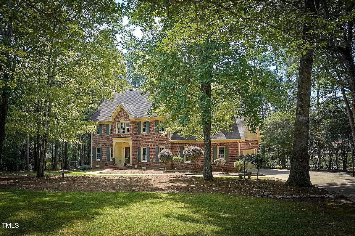 1708 Pendelton Drive Raleigh, NC 27614 - Photo 53 of 54 a front view of a house with garden