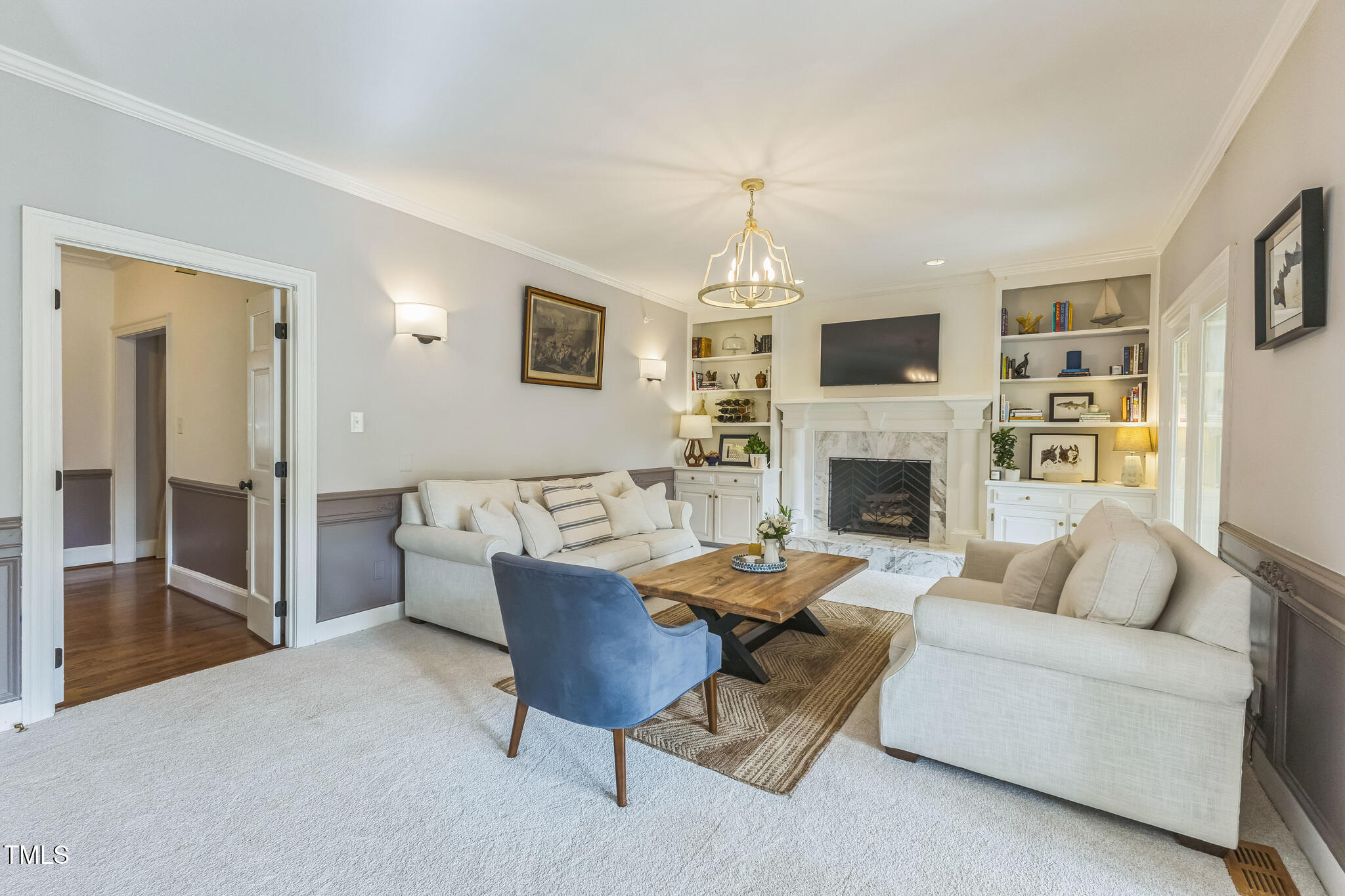 1708 Pendelton Drive Raleigh, NC 27614 - Photo 7 of 54 a living room with furniture fireplace and a table