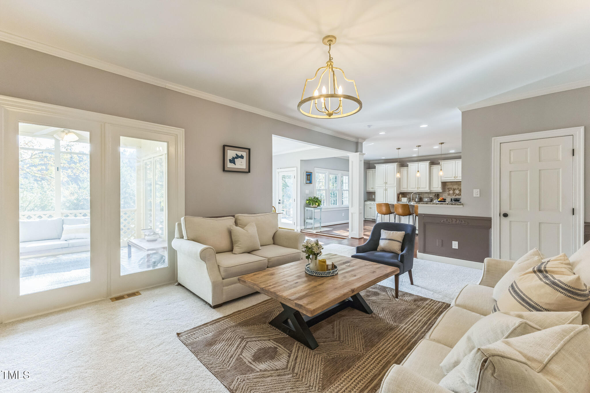 1708 Pendelton Drive Raleigh, NC 27614 - Photo 8 of 54 a living room with furniture kitchen view and a window