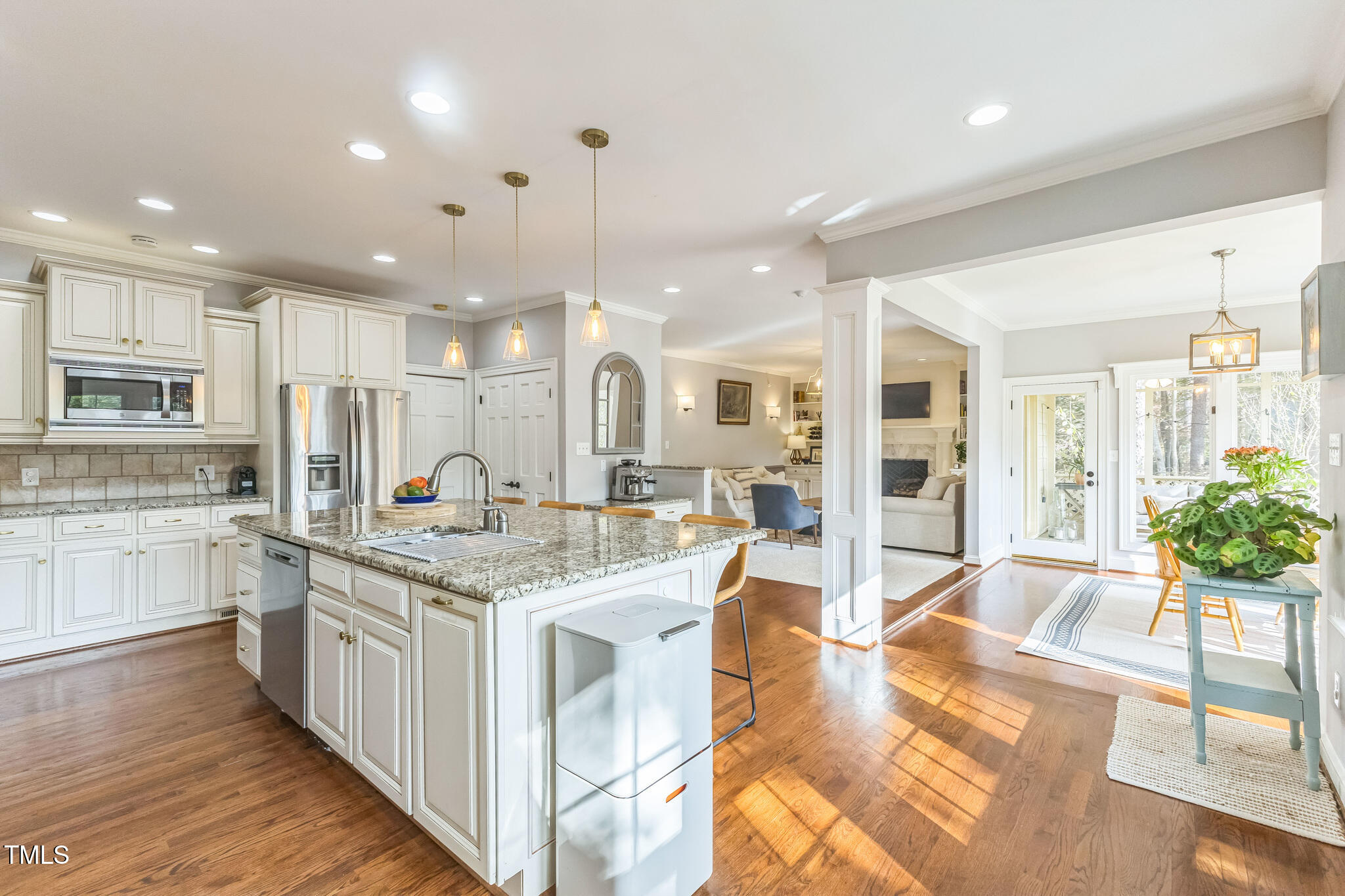 1708 Pendelton Drive Raleigh, NC 27614 - Photo 9 of 54 a kitchen with stainless steel appliances granite countertop a stove top oven a sink and a refrigerator