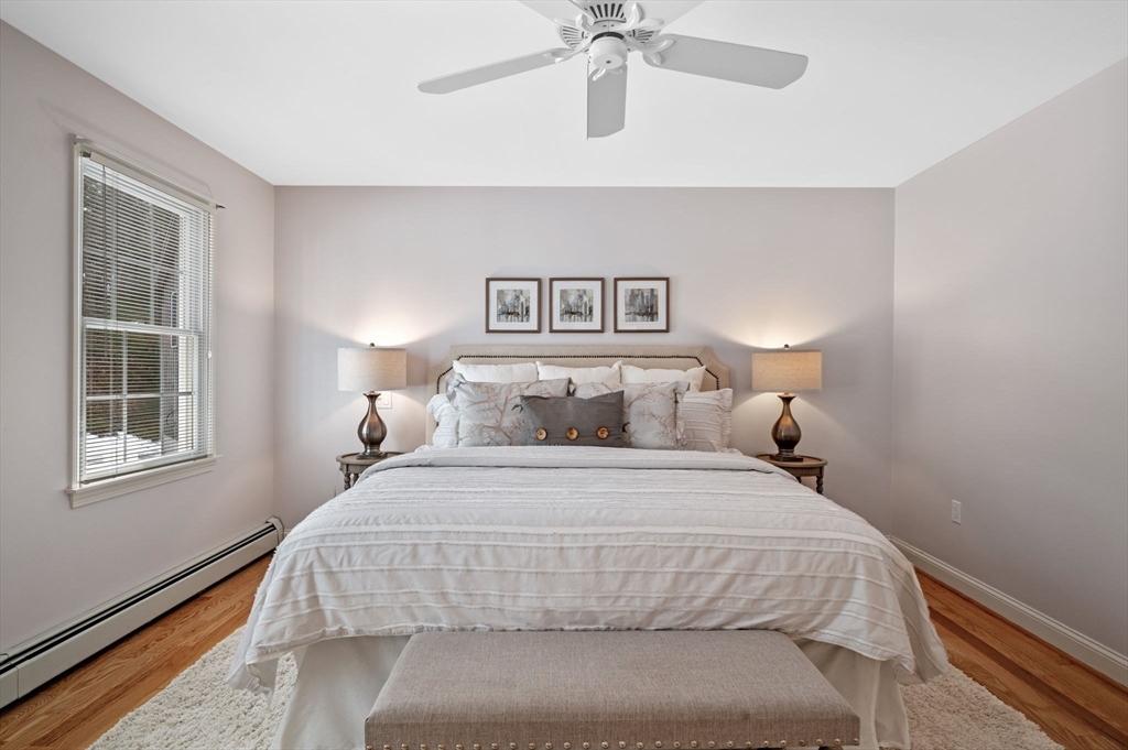 512 A Main Street Boxford, MA 01921 - Photo 15 of 41 a bedroom with a bed and window