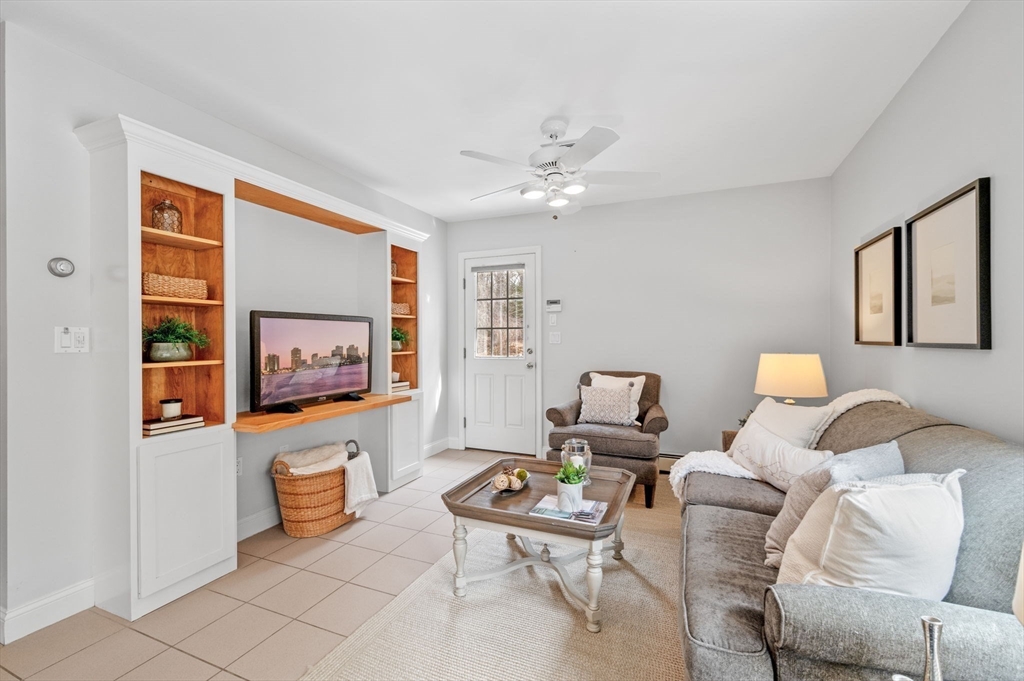 512 A Main Street Boxford, MA 01921 - Photo 21 of 41 a living room with furniture and a flat screen tv