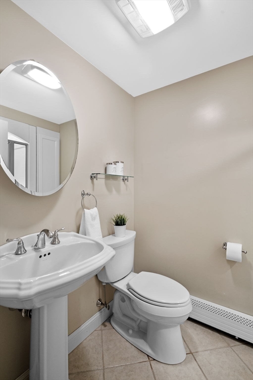 512 A Main Street Boxford, MA 01921 - Photo 30 of 41 a bathroom with a sink a toilet and mirror
