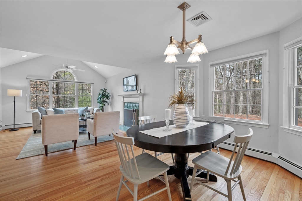 512 A Main Street Boxford, MA 01921 - Photo 3 of 41 a view of a dining room with furniture wooden floor and chandelier