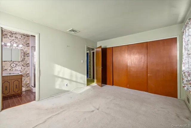 a view of a room with an entryway