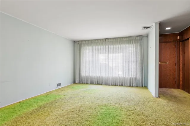 a view of an empty room with window