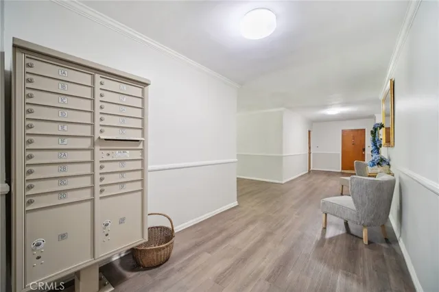 a view of a room with gym equipment and a window