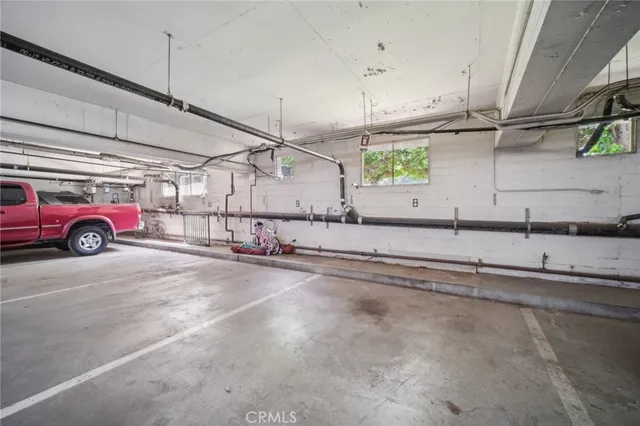 a view of a chairs and table in the patio