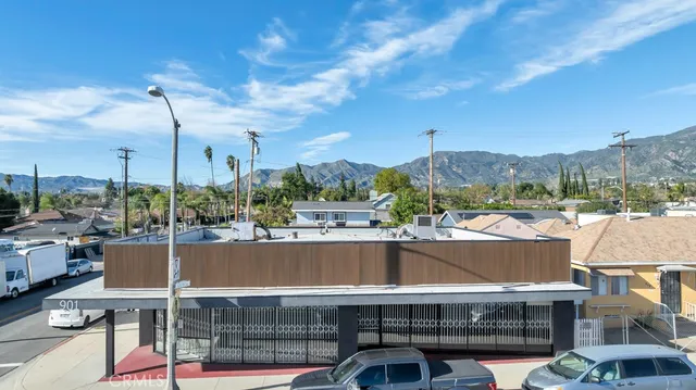 a view of a balcony with couches