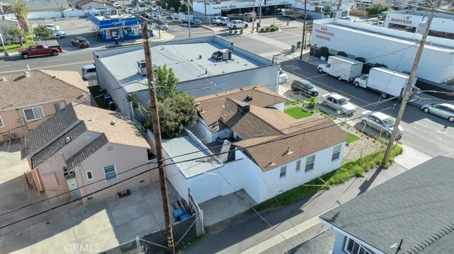 an aerial view of a house with swimming pool