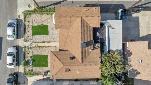 an aerial view of a city with lots of residential buildings