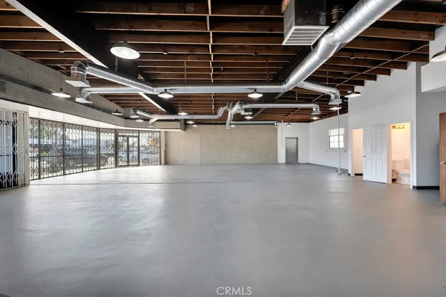 a view of water heater room with garage