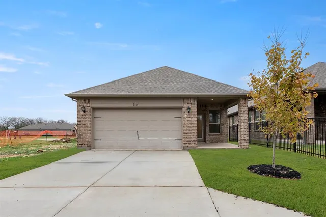 a house view with a garden space