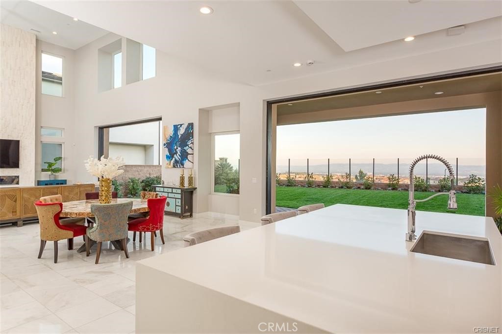 11527 North Darcy Porter Ranch Porter Ranch, CA 91326 - Photo 14 of 32 a view of a patio with a table and chairs