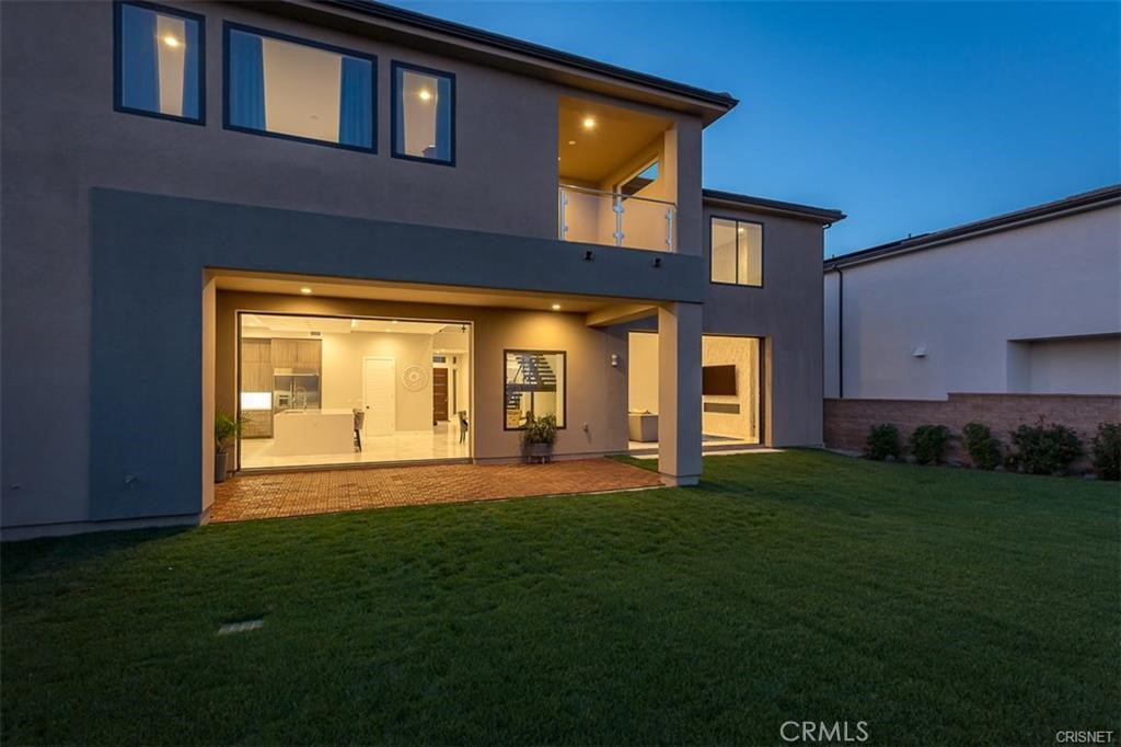11527 North Darcy Porter Ranch Porter Ranch, CA 91326 - Photo 20 of 32 a view of a house with backyard and porch