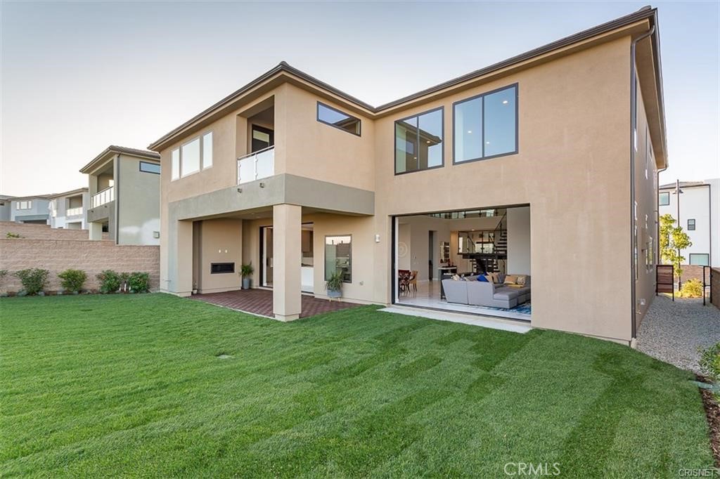 11527 North Darcy Porter Ranch Porter Ranch, CA 91326 - Photo 8 of 32 a front view of a house with yard and porch
