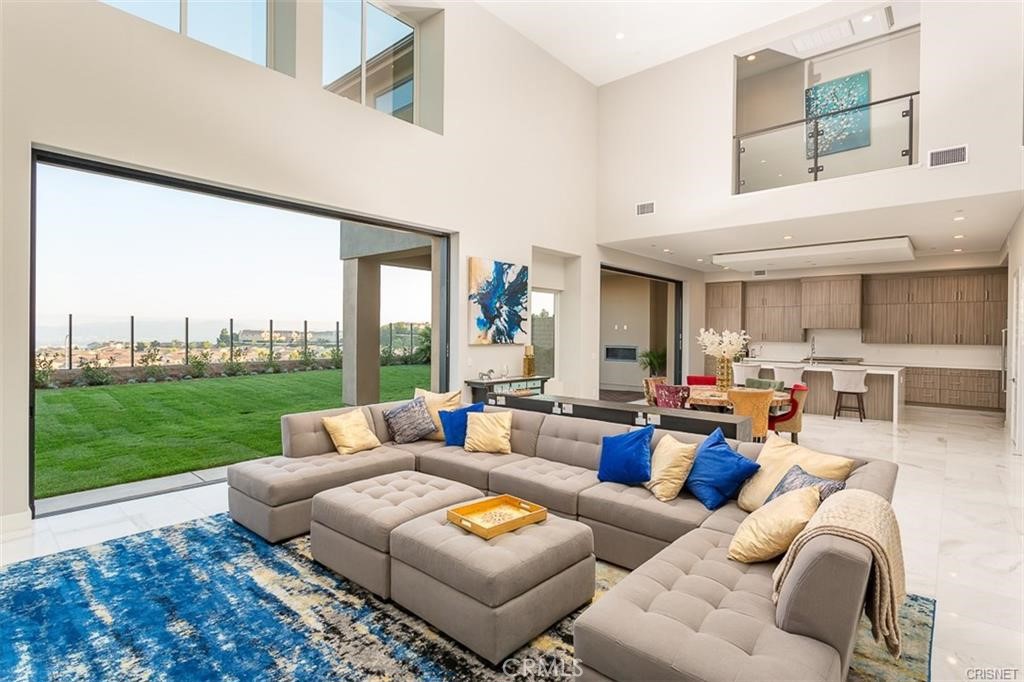 11527 North Darcy Porter Ranch Porter Ranch, CA 91326 - Photo 9 of 32 a living room with furniture and a large window