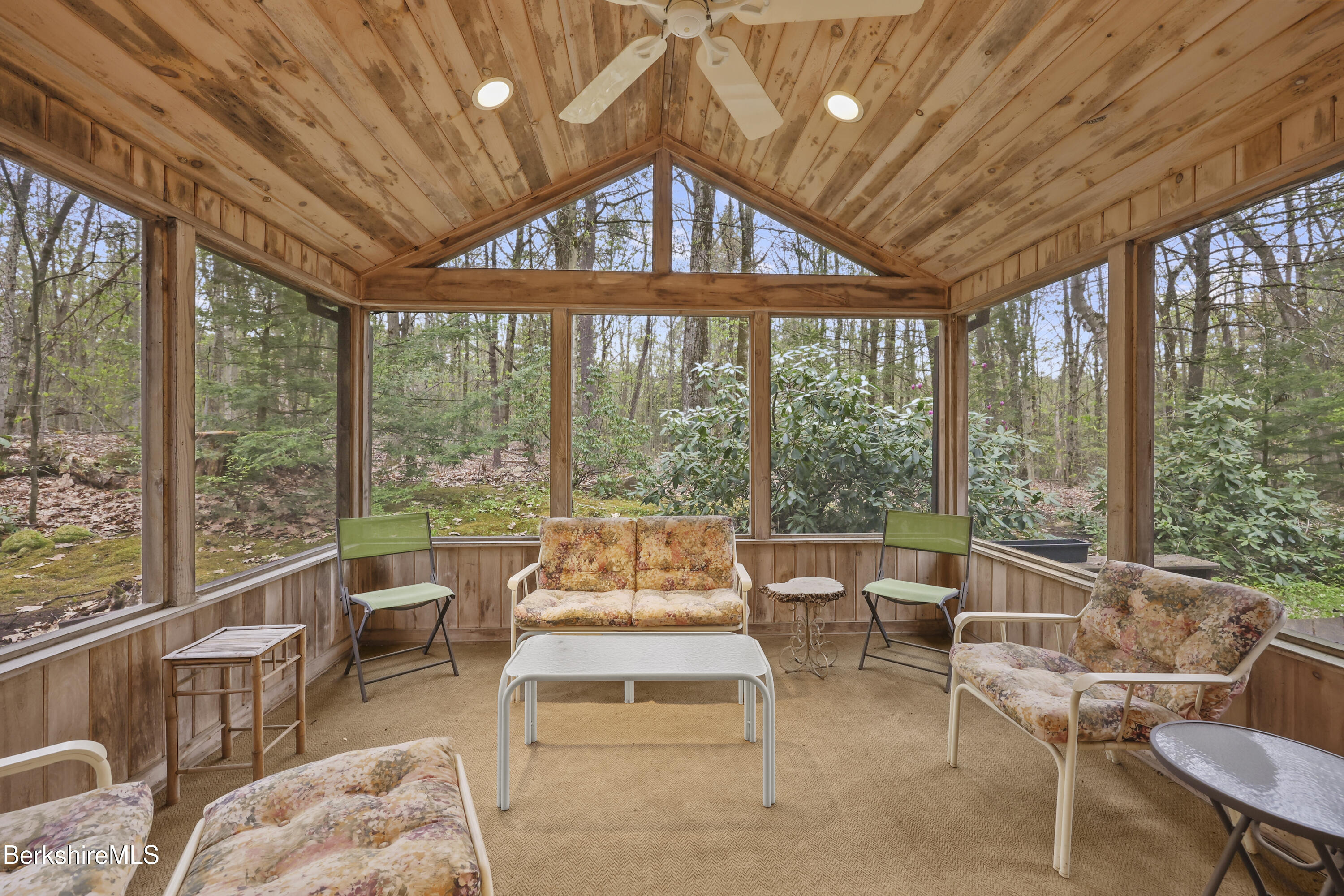 422 Bonny Rigg Hill Road Becket, MA 01223 - Photo 43 of 60 a living room with furniture tv and large windows