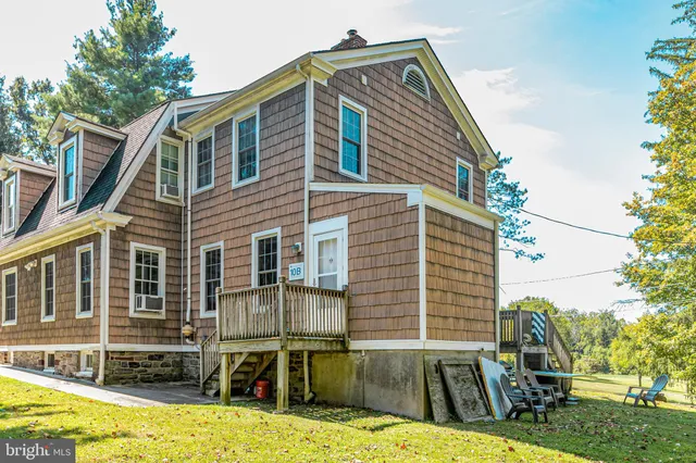 a view of a house with swimming pool