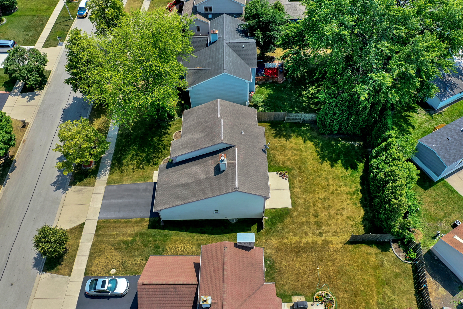 700 Greenview Lane Wheeling, IL 60090 - Photo 21 of 26 an aerial view of a house with a yard pool outdoor seating and yard
