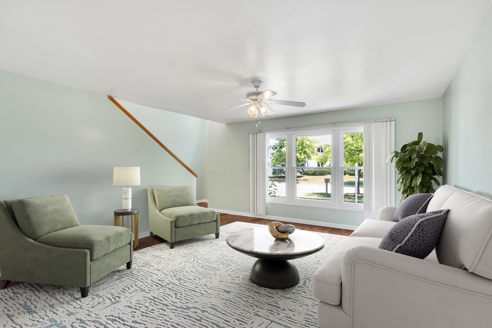 700 Greenview Lane Wheeling, IL 60090 - Photo 3 of 26 a living room with furniture and a large window