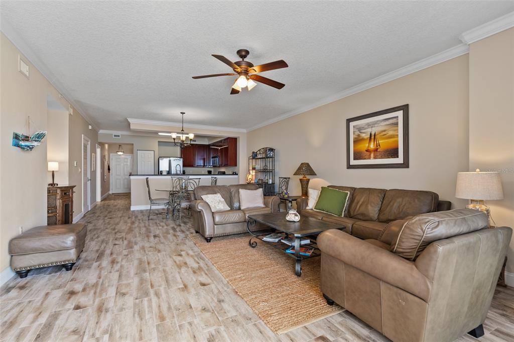 60 Surfview Drive, Unit 502 Palm Coast, FL 32137 - Photo 14 of 63 a living room with furniture and wooden floor
