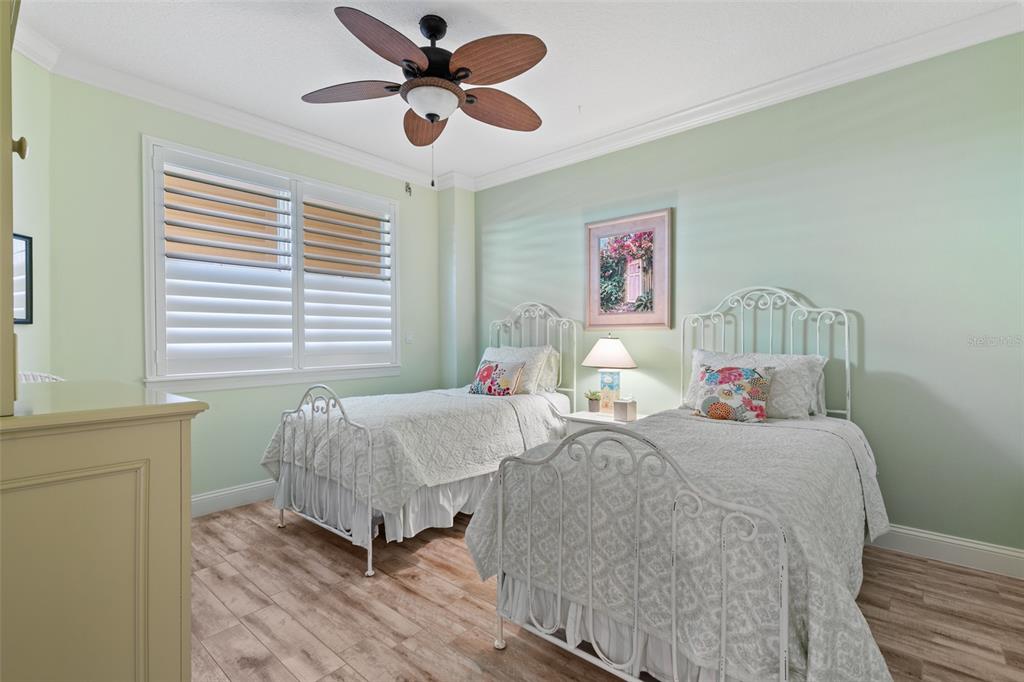 60 Surfview Drive, Unit 502 Palm Coast, FL 32137 - Photo 27 of 63 a bedroom with bed and a window