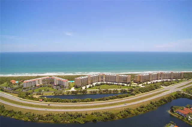 front view of a house with a swimming pool